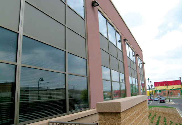 This image depicts a law enforcement building with Mapes paneling.
