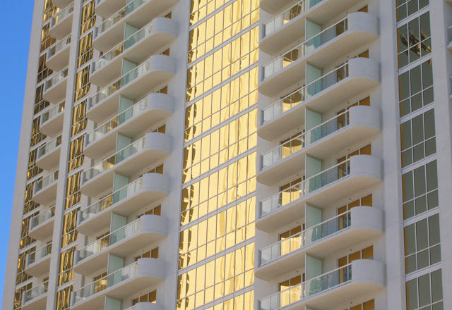 This image depicts a building with MapeStop panels integrated into the design.