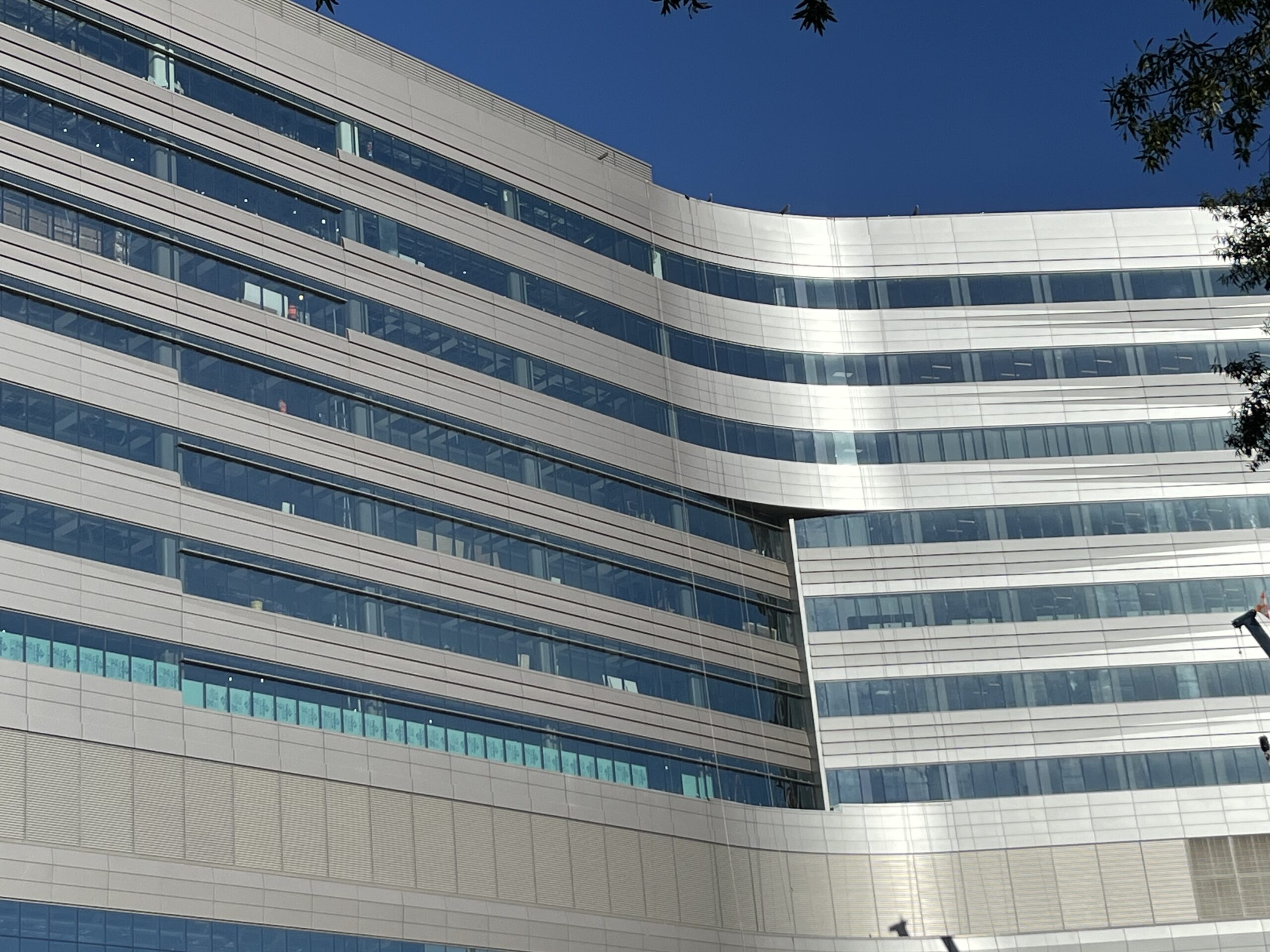 Curved façade of the Atrium Health Bed Tower, Charlotte, NC